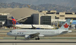 C-GPWG @ KLAX - Taxiing to gate at LAX - by Todd Royer