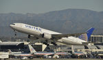 N214UA @ KLAX - Departing LAX on 25R - by Todd Royer