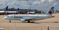 C-FEJP @ KORD - Taxi O'Hare - by Ronald Barker