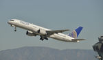 N552UA @ KLAX - Departing LAX on 25R - by Todd Royer