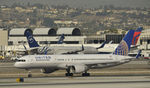 N588UA @ KLAX - Taxiing to gate at LAX - by Todd Royer