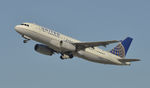 N431UA @ KLAX - Departing LAX on 25R - by Todd Royer