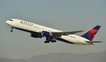 N136DL @ KLAX - Departing LAX on 25R - by Todd Royer