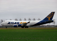 N409MC @ AMS - Taxi from runway 18R to the gate of Schiphol Airport - by Willem Göebel