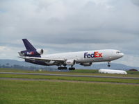 N574FE @ NZAA - landing at NZ - by magnaman