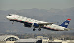 N569UW @ KLAX - Departing LAX on 25R - by Todd Royer