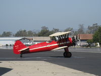 N66711 @ SZP - 1941 Boeing Stearman IB75A, Jacobs R755B2 275 Hp upgrade, Experimental class, about to cross Rwy 22 - by Doug Robertson