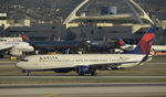N803DN @ KLAX - Taxiing to gate at LAX - by Todd Royer