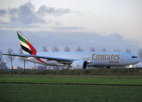 A6-EFO @ AMS - Taxi to runway 36L of Schiphol Airport - by Willem Göebel