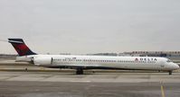 N911DA @ KORD - MD-90-30 - by Mark Pasqualino