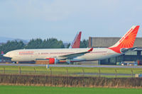 VT-IWA @ EGDX - A330-223, Air India, previously F-WWYN, SE-RBF, F-WQVY, arrived 25/11/14, seen at ECube Solutions MOD St Athan, sister ac VT-IWB in background.