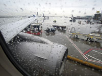 N831UA @ KSFO - Heavy rain at SFO - by Micha Lueck