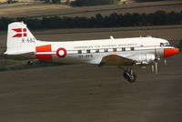 OY-BPB @ EKRK - Air to air photo of OY-BPB close to landing. - by Stig Jakobsen