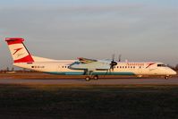 OE-LGF @ EDDP - Morning shuttle to VIE on taxi along twy A7 down to rwy 26R.... - by Holger Zengler
