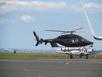 ZK-HXW @ NZAA - Taxying in to land n convair apron - by magnaman