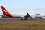 VH-QPG @ YSSY - taxiing from 34R - by Bill Mallinson