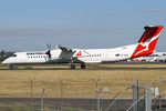 VH-QOS @ YSSY - taxiing to 34R - by Bill Mallinson