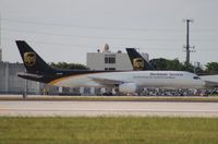 N469UP @ MIA - UPS 757-200 - by Florida Metal