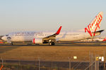 VH-YIS @ YSSY - taxiing to 34R - by Bill Mallinson
