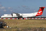 VH-QOC @ YSSY - taxiing to 34R - by Bill Mallinson