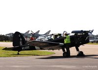 WG486 @ EGXC - Flightline staff at work on the BBMF's Chippie at RAF Coningsby EGXC - by Clive Pattle