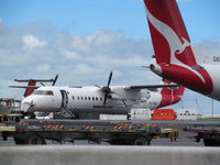 VH-TQE @ YBBN - on domestic apron - by magnaman