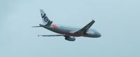 VH-VQH @ YBBN - on departure from BNE - taken from int'l terminal - by magnaman