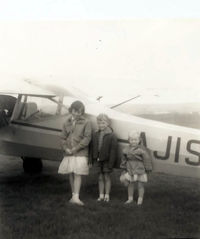 G-AJIS @ HURN - This was our first plane trip way back in the Summer of 1961.
In the photo: Janet Elizabeth Jones, Michael Andrew Jones and Alayne Margaret Jones
Probably Hurn Airport, Bournemouth - by David Antony Jones