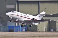 ZD620 @ EGHH - Departing off 26 - by John Coates