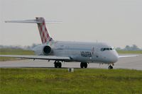 EI-EWI @ LFRB - Boeing 717-2BL, Reverse thrust Taxiing to boarding area, Brest-Bretagne Airport (LFRB-BES) - by Yves-Q