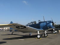 N670AM @ CMA - 1993 Douglas/Maloney SBD-5 DAUNTLESS Dive Bomber, Wright R-1820 Cyclone 9 cylinder radial 1,200 Hp, a real flying rarity now. Note: Dive brakes retracted. Experimental class - by Doug Robertson