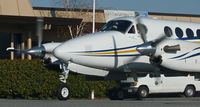 N50HV @ KSQL - A local King Air B200 taxis for a flight out to Van Nuys from San Carlos. - by Chris L.