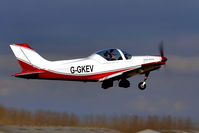 G-GKEV @ EGBR - Gear retracting - by glider