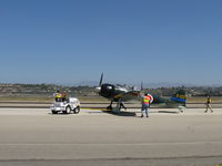 N712Z @ CMA - 1942 Mitsubishi A6M3 ZERO-SEN, P&W R-1830 1,130 Hp upgrade from original Sakai. Spotting the aircraft on air show flight line ramp. - by Doug Robertson