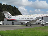 ZK-PLK @ NZAR - outside hawker pacific hangar - by magnaman