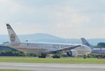 A6-ETB @ EGCC -  Etihad 016 taxiing out for departure to AUH - by Mike stanners