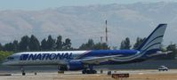 N176CA @ KSJC - A rare 1990 Boeing 757 taking off on runway 30L at San Jose International for a military charter. - by Chris L.