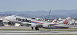 LX-VCV @ KLAX - Departing LAX on 25L - by Todd Royer