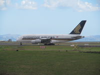 9V-SKE @ NZAA - turning onto runway - by magnaman