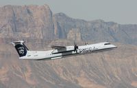 N410QX @ KLAS - DHC-8-402 - by Mark Pasqualino