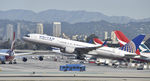 N588UA @ KLAX - Departing LAX on 25R - by Todd Royer