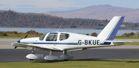 G-BKUE @ OBAN - Hard stand at airport building - by Mountaingoat