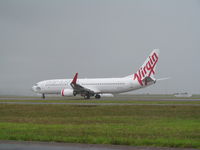 VH-YIU @ NZAA - Taxying down for departure - by magnaman