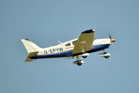 G-EPYW @ EGMD - Lydd Aero Club Piper departing Lydd