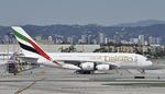 A6-EOF @ KLAX - Taxiing to gate at LAX - by Todd Royer