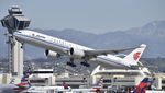 B-2085 @ KLAX - Departing LAX on 25R - by Todd Royer