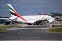 A6-EDX @ EGCC - aircraft being pushed back from its stand/gate by an tug - by andy-man-egcc