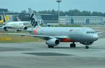 9V-JSE @ WSSS - Jetstar A320 taxying in. - by FerryPNL
