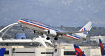 N919AN @ KLAX - Departing LAX on 25R - by Todd Royer