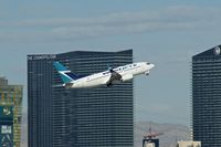C-GWSO @ KLAS - WestJet Airlines, is here climbing out Las Vegas Int'l(KLAS) with the Cosmopolitan Hotel in the background - by A. Gendorf